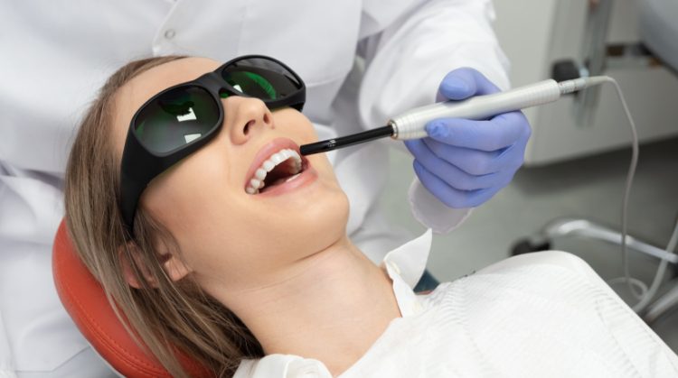 Patient receiving laser dental treatment at Mark Michna, DDS in Greenbrae, CA